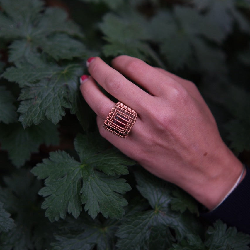 Cagey Caged Ring